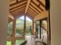 Charpente apparente intérieur maison ossature bois - Villard de Lans