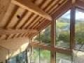 Charpente apparente intérieur maison ossature bois - Villard de Lans
