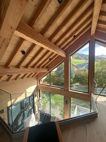 Charpente apparente intérieur maison ossature bois - Villard de Lans